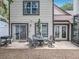 Large patio with an outdoor dining set, ideal for entertaining at 2706 Donaldson Dr, Orlando, FL 32812
