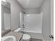 Clean bathroom featuring a tub, toilet, and vanity, offering a functional and comfortable space at 2708 La Posada Dr, The Villages, FL 32162