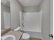 Spotless bathroom featuring a tub, toilet, and vanity, offering a functional and comfortable space at 2708 La Posada Dr, The Villages, FL 32162