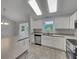 Beautifully updated kitchen with plenty of counter space and modern appliances for gourmet cooking at 2708 La Posada Dr, The Villages, FL 32162