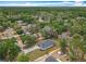Aerial view of a single Gathering house in a wooded area at 278 Acorn Dr, Longwood, FL 32750