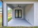 Covered patio with ceiling fan, perfect for outdoor relaxation and entertaining at 278 Acorn Dr, Longwood, FL 32750