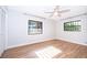 Clean bedroom with wood style floors, great natural light, and spacious closet at 2814 Conway Gardens Rd, Orlando, FL 32806