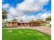 Stunning single story home with wooden facade and spacious covered parking at 2814 Conway Gardens Rd, Orlando, FL 32806