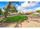 Charming home featuring a well-manicured lawn and a long gravel driveway with ample parking space at 2814 Conway Gardens Rd, Orlando, FL 32806