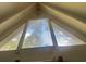 A-frame windows showcase exterior trees at 283 Oak Ln, New Smyrna Beach, FL 32168