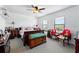 Bedroom with neutral walls, two windows and carpet floors at 2926 Boating Blvd, Kissimmee, FL 34746