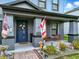 A welcoming front porch with charming decor, comfortable seating, and a decorative front door at 2926 Boating Blvd, Kissimmee, FL 34746