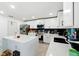 Bright kitchen with stainless steel appliances, large island, and ample cabinets at 2926 Boating Blvd, Kissimmee, FL 34746