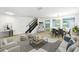 Spacious living room with staircase and dining area at 2926 Boating Blvd, Kissimmee, FL 34746