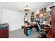 A home office featuring a work desk with comfortable rolling chair and decorative wall art at 2926 Boating Blvd, Kissimmee, FL 34746