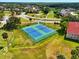 Aerial view of the community tennis courts surrounded by green space at 2926 Boating Blvd, Kissimmee, FL 34746