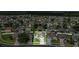 Aerial view of a neighborhood with sidewalks showing the layout of the neighborhood at 2975 White Cedar Cir, Kissimmee, FL 34741
