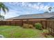 Large fenced backyard is perfect for outdoor entertaining and relaxation at 311 Lakebreeze Cir, Lake Mary, FL 32746
