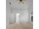 Generously sized bedroom with carpeted floors, a ceiling fan, and an en-suite bathroom at 311 Lakebreeze Cir, Lake Mary, FL 32746