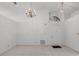Bright living room with vaulted ceiling, ceramic tile flooring, and modern light fixtures at 311 Lakebreeze Cir, Lake Mary, FL 32746
