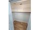 Open closet with built-in shelving and wood-look flooring at 3146 Byington Terrace Ter, Deltona, FL 32738