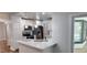 Well-lit kitchen featuring stainless steel appliances and sleek marble countertops at 3146 Byington Terrace Ter, Deltona, FL 32738