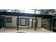 Covered and screened lanai with ceiling fans and views of the backyard at 3146 Byington Terrace Ter, Deltona, FL 32738