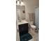 Compact bathroom with a single vanity, toilet, and shower-tub combination at 3986 Bedford Ave, Winter Haven, FL 33884