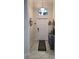 Inviting foyer features neutral colors, tile flooring, and decorative wall art at 3986 Bedford Ave, Winter Haven, FL 33884