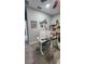 Home office setup with desk, computer monitor, and organizational shelving for productivity at 3986 Bedford Ave, Winter Haven, FL 33884