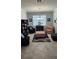 Inviting living room with neutral walls, tile floors, and plenty of natural light at 3986 Bedford Ave, Winter Haven, FL 33884