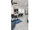 Open-concept living space with kitchen, dining, and living areas, promoting easy interaction at 3986 Bedford Ave, Winter Haven, FL 33884
