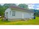 Charming home featuring a brick exterior, new roof, and a well-maintained lawn at 412 Bay Nw St, Fort Meade, FL 33841