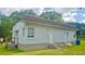 Charming home featuring a brick exterior, new roof, and a well-maintained lawn at 412 Bay Nw St, Fort Meade, FL 33841