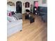 Cozy living room featuring wood floors and modern furnishings at 412 Bay Nw St, Fort Meade, FL 33841
