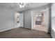 Spacious bedroom with an ensuite bathroom and an ample closet at 4161 Leafy Glade Pl, Casselberry, FL 32707