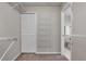 Walk-in closet with built-in shelving and ample storage space at 4161 Leafy Glade Pl, Casselberry, FL 32707