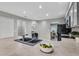 Modern kitchen design with stainless sink, neutral countertops and access to dining space at 4161 Leafy Glade Pl, Casselberry, FL 32707