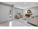 Stylish living room showcasing neutral walls, tile floors, and elegant furniture arrangement that provides comfort and sophistication at 4161 Leafy Glade Pl, Casselberry, FL 32707