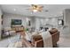 Comfortable living area featuring a sofa, modern furnishings, and a cozy ambiance at 4161 Leafy Glade Pl, Casselberry, FL 32707