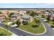 Aerial view of a beautiful home with manicured landscaping and a paved driveway at 426 Vista Loop, Davenport, FL 33897