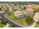 A captivating aerial view showcases a well-maintained home with a screened pool in a desirable neighborhood at 426 Vista Loop, Davenport, FL 33897