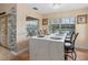 Kitchen showcasing a marble island with barstool seating and a decorative accent wall at 426 Vista Loop, Davenport, FL 33897