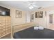 The main bedroom featuring a ceiling fan, neutral decor, and plush carpeting at 426 Vista Loop, Davenport, FL 33897