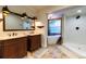 Beautiful bathroom featuring double vanity, soaking tub, and open shower concept at 446 Piney Croft Ln, Maitland, FL 32751