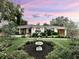 Charming home features a beautifully landscaped front yard with a decorative fountain at 446 Piney Croft Ln, Maitland, FL 32751