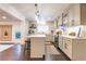 Bright, updated kitchen with an island, stainless steel appliances and hardwood floors at 446 Piney Croft Ln, Maitland, FL 32751
