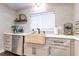 Stylish kitchen sink with stainless steel dishwasher at 446 Piney Croft Ln, Maitland, FL 32751