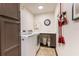 Well-equipped laundry room with modern washer and dryer, lots of storage and folding space at 446 Piney Croft Ln, Maitland, FL 32751