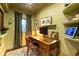 Cozy office space featuring an antique wood desk, and decor at 446 Piney Croft Ln, Maitland, FL 32751