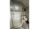 Bathroom showcasing a glass shower with tile surround and fixtures at 447 Cadiz Loop, Davenport, FL 33837