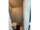 Cozy bathroom featuring a shower and toilet at 447 Cadiz Loop, Davenport, FL 33837