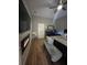 Spacious bedroom featuring fireplace, mounted TV, desk, and decorative elements at 447 Cadiz Loop, Davenport, FL 33837