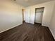 Bedroom featuring new flooring and closet at 5123 Turnbull Dr, Orlando, FL 32812